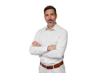 Mature man standing confidently, smiling with arms crossed, wearing a white shirt and light pants. Transparent background