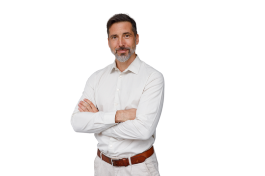 Mature man standing confidently, smiling with arms crossed, wearing a white shirt and light pants. Transparent background