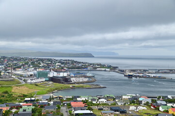 Dramatic Aerial View of Torshavn with Storm Clouds Over the Capital of Faroe Islands