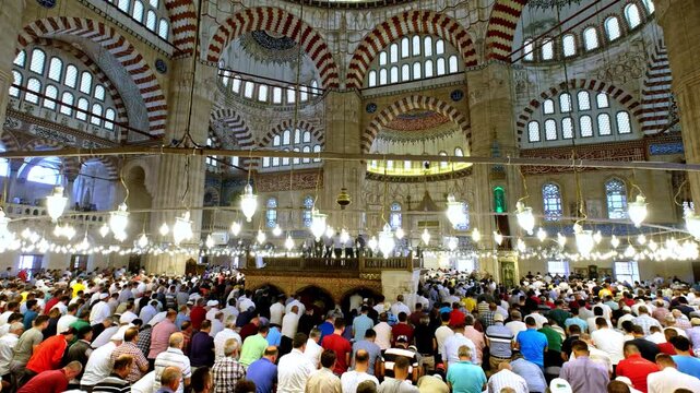 Muslim congregation performing prostration in a mosque. A spiritual moment symbolizing humility, devotion, and unity in Islamic worship.