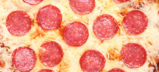 Delicious pepperoni pizza as background, top view
