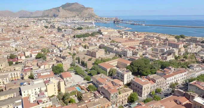Aerial view of the city of Palermo, Sicily, Italy. The city and its port overlook the Mediterranean Sea, with Mount Pellegrino in the background. The Kalsa neighborhood is in the foreground.