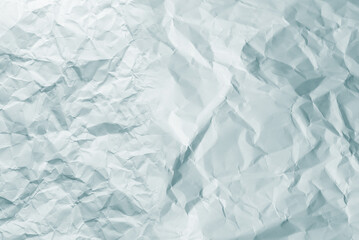 Obraz premium Crumpled white paper background.
