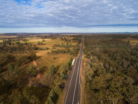 Truck pulled over beside Newell Highway road in Dubbo seen from aerial view