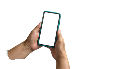 Hands holding a phone with a blank white screen, cyan case, against a black background