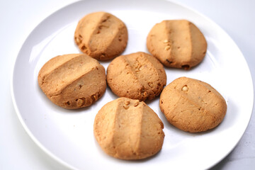Sweet Biscuits on Clean White Surface with Copy Space.