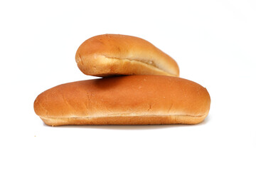 Soft bakery hot dog buns on white background.