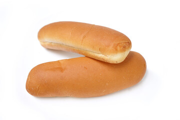 Fresh soft hot dog rolls on white background.