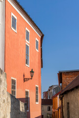 Colorful building facade with street lamp in Broumov