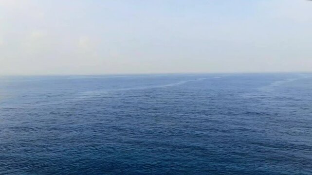 Calm ocean water revealing Sunda strait, Lampung, Indonesia