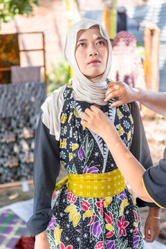 Indonesian batik attire with intricate traditional patterns