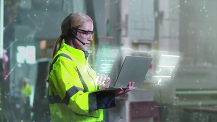 Caucasian female engineer in reflective jacket and headset using laptop in industrial workspace. Holographic interface with data visuals floating around. Concept of smart industry technology. - Powered by Adobe
