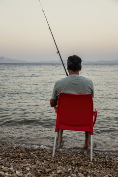 Serene fishing at sunset by the sea