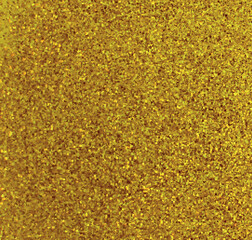 Golden-yellow organic mustard seeds create a stunning, natural, abstract macro pattern with a healthy, appealing texture perfect for a food ingredient backdrop