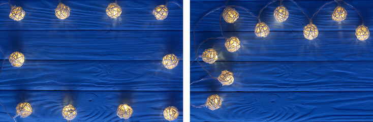 christmas garland lights on blue wooden background with copy space for your text. Top view