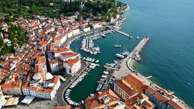 Aerial View of Historic Piran Harbor and Red Tiled Roofs in Slovenia