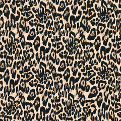 Realistic leopard print seamless pattern. Classic wild animal fur texture background. Trendy and stylish cheetah skin illustration for fashion fabric, textile print, or glamorous wallpaper. © Creativezone