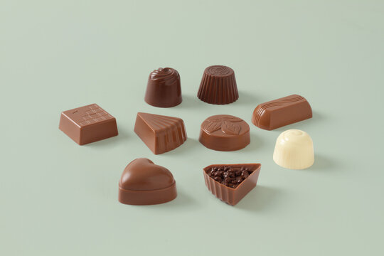 Assorted Chocolates Displayed on Minimal Background