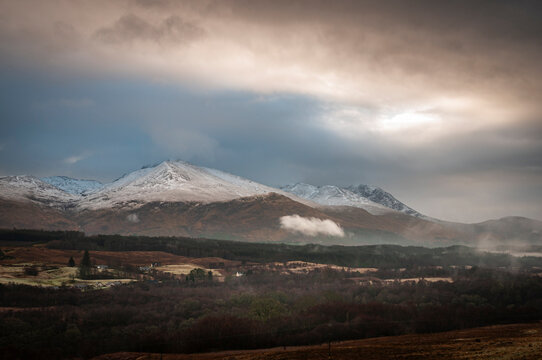 A cold, wintery, misty HDR image of the Nevis Range from the north near Spear Bridge, Lochaber, Scotland.