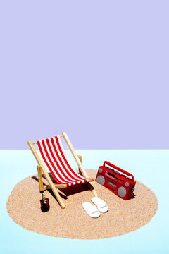 Miniature beach setup with deck chair and radio