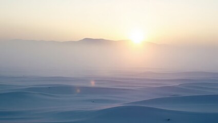 Misty Sunrise Over a Vast Snowy Winter Landscape.