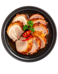 Roasted chicken slices in dark bowl