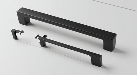 Black metal furniture hardware handles against white surface for design