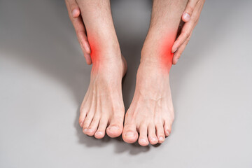 Achilles tendon injury, joint inflammation, foot pain, man suffering from feet ache, podiatry concept