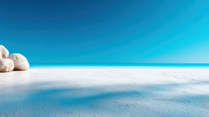 A tranquil beach scene showcasing smooth white sands and a bright turquoise ocean under a clear sky, evoking a sense of peace and relaxation in a coastal paradise.
