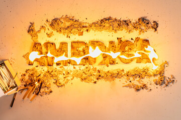 The word America burns on white seamless background