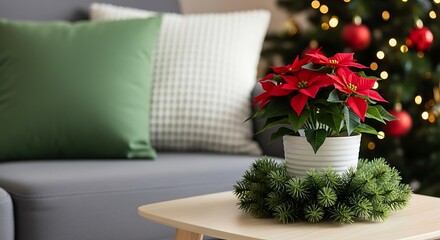 Festive Christmas Poinsettia Arrangement with Tree on a Table Indoors
