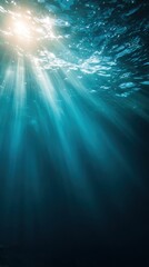 Sunlight Beams Illuminating Clear Blue Water Underwater Scene Soft Blur Environment Tranquil Perspective Visual Serenity