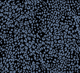 Abstract blue leopard print seamless pattern on a black background. Modern wild animal spot illustration. Moody and stylish cheetah skin texture for fashion fabric, textile, or wallpaper. © Creativezone