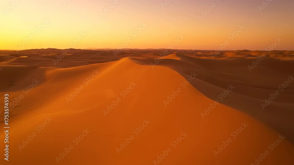 Canvas Prints aerial gliding shot over undulating desert sand dunes with subtle wind creating natural swirling pat