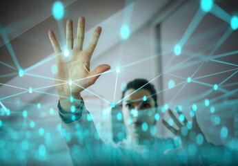 Woman using digital light network interface in modern interior