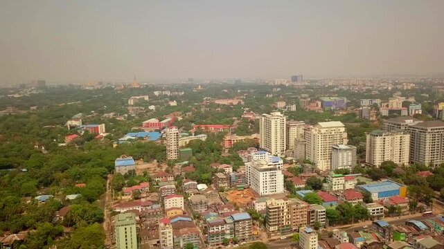  Futuristic aerial view panorama of developing Yangon city , Aerial view of Sule pagoda in downtown, Yangon, Myanmar. Sule Pagoda located in the heart of Yangon, Karaweik royal barge, Kandawgyi Lake, 