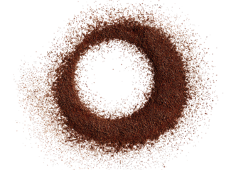 Circular, brown, granular pattern with a dark center.  Small, colored particles form a ring, densely packed
