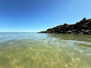 Beach landscape, sea view of crystal clear water and blue sky horizon