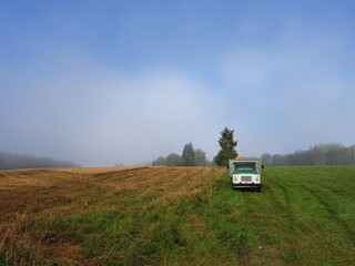 Fototapeta premium old russian truck on the farm field