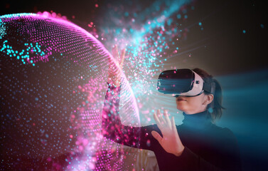 Woman wearing VR headset exploring digital holographic globe
