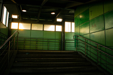 Green Underground Passage with Stairs and Evening Light