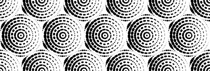 seamless concentric dot pattern forming radial rings with a halftone print effect. sketchy stamp-style background, handcrafted texture for retro designs, posters, and graphic.