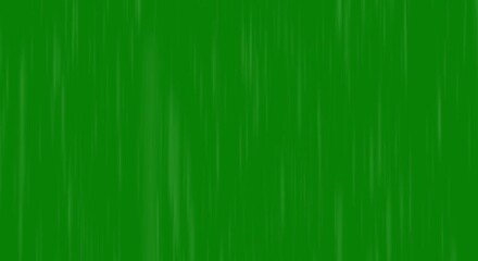Dynamic rain effect overlay on rich green background for weather simulations and visual effects
