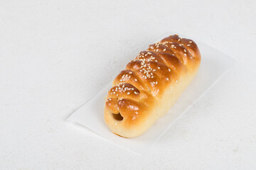 Hot sausage in the dough. Hot dog. Fast food. White background	