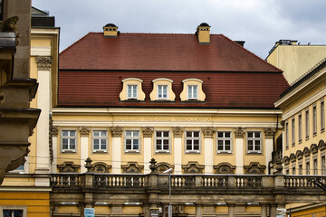 Ornate 18th-century Muzeum Miejskie Wrocławia building with intricate facade and red tile roof in the historic city center of Wrocław, Poland. © paws and prints