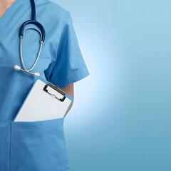 doctor holding a blank clipboard