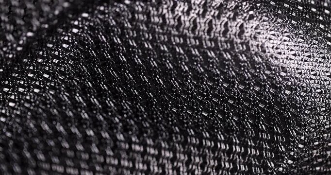 black thick fabric to provide ventilation at the back of backpacks and bags, close up