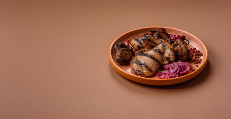 Chicken breast cooked on a grill or barbecue with sauce. Grilled chicken