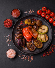 Grilled vegetables, bell peppers, mushrooms, and zucchini, a vegetarian meal. Grilled vegetables