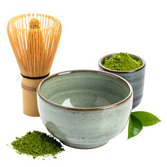 Matcha tea preparation whisk, bowls of powder & brew, plus leaves. Isolated on black